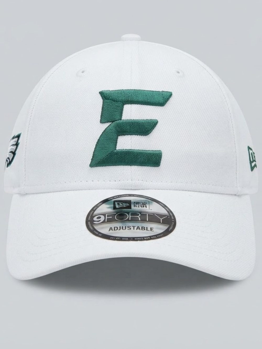 New Era White Hat with Dark Green Embroidered E